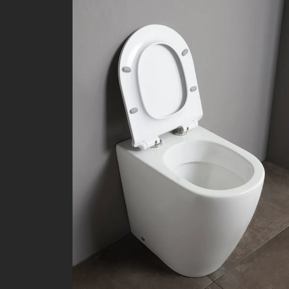 Vaso Wc con Scarico Traslato e Sedile Soft Close in Ceramica - Oleandro Viadurini